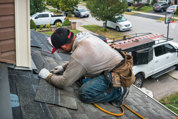 Professional Roofing technician working in Waccabuc, NY